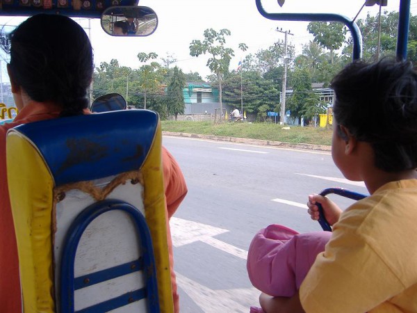 A woman driver with her daughter