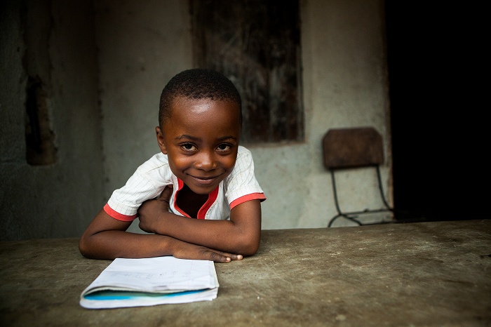 A studying child in Sierra Leone