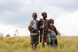 Children holding a bottle of water, Burundi